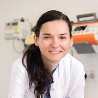 Dr. Iza-Maria Ravasz, 